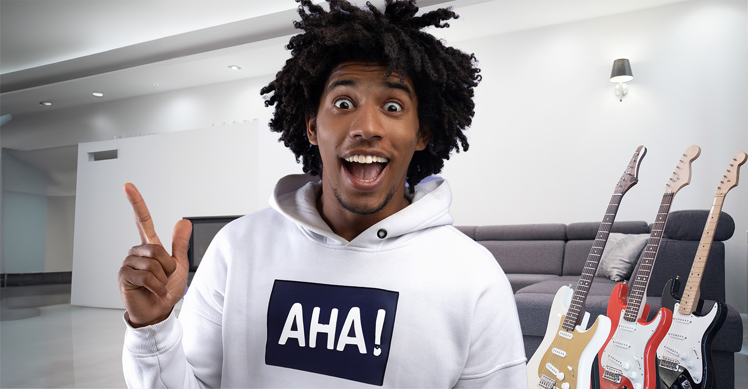 Image of guitar player having an aha moment.